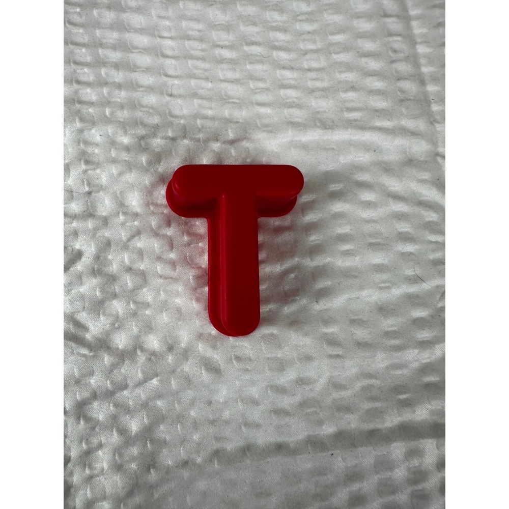 Letter "T" for Elmo On The Go learning game.